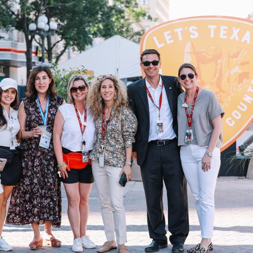 IPWD23 DH Let's Texas Background and Group